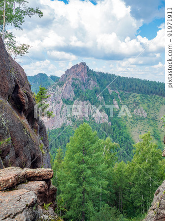 High forest rocks for advanced hiking and alpinism. 91971911