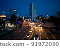Night view of the city Running cars and ball bokeh 91972030