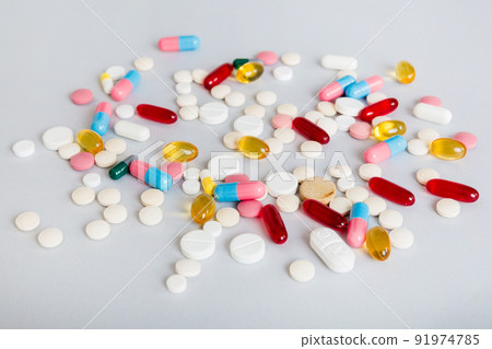 Many different colorful medication and pills perspective view. Set of many pills on colored background Many different colorful medication and pills perspective view. Set of many pills on colored background 91974785