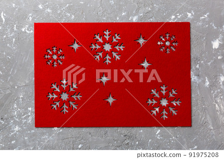 Top view of red tablecloth for food on cement background. Empty space for your design Top view of red tablecloth for food on cement background. Empty space for your design 91975208