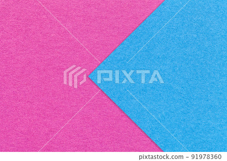 Texture of purple and blue paper background, half two colors with arrow, macro. Structure of craft magenta cardboard Texture of purple and blue paper background, half two colors with arrow, macro. Structure of craft magenta cardboard 91978360