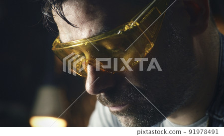 Tired man wiping his forehead Tired man wiping his forehead 91978491
