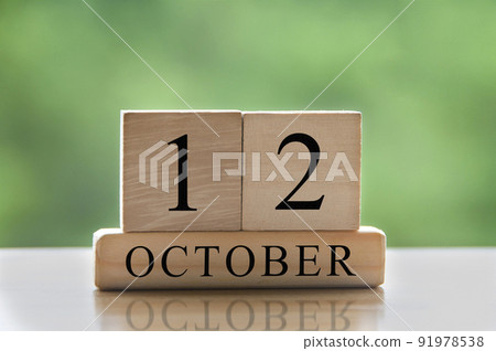 October 12 calendar date text on wooden blocks with copy space for ideas. Copy space and calendar concept 91978538