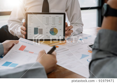 Business people are meeting for analysis data figures to plan business strategies. Business discussing concept Business people are meeting for analysis data figures to plan business strategies. Business discussing concept 91979471