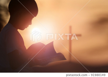 Red sunset sky, bright sun light and the holy cross of Jesus Christ 91980149