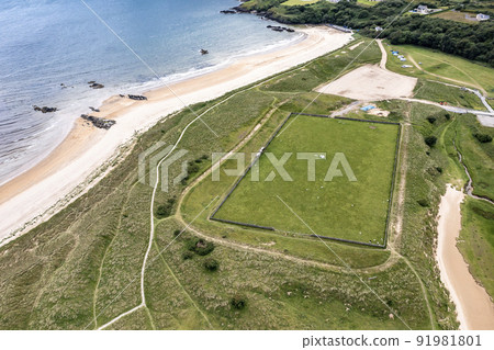Aerial view of the Killybegs GAA pitch at Fintra beach by Killybegs, County Donegal, Ireland 91981801