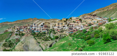 panorama of the entire ancient mountain village Chokh on a rocky slope in Dagestan panorama of the entire ancient mountain village Chokh on a rocky slope in Dagestan 91983122