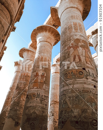 Ancient ruins on an abandoned temple with columns full of hieroglyphs in Egypt 91983504
