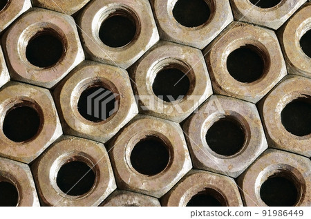 Close-up of rusty nuts Close-up of rusty nuts 91986449