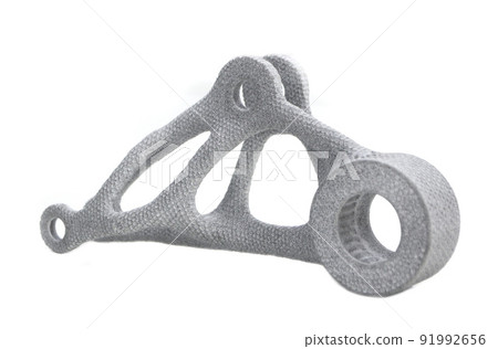 Model printed on 3D printer isolated on white background. Object details printed on 3D printer from plastic close-up. Prototype of shape made by 3d printer. Concept new modern printing technology 91992656