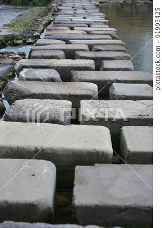 The beautiful Woldaecheon stepping stone bridge in Jeju The beautiful Woldaecheon stepping stone bridge in Jeju 91993425