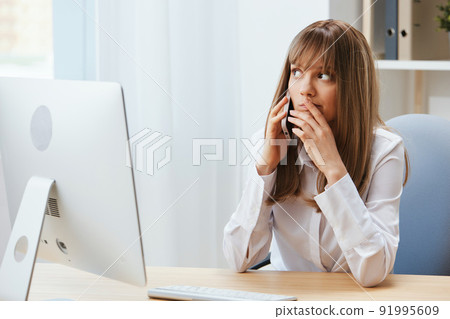 Excited adorable blonde businesswoman worker make difficult decision talking with client in call in light modern office. Nervous employee work on computer online in support service. Copy space Excited adorable blonde businesswoman worker make difficult decision talking with client in call in light modern office. Nervous employee work on computer online in support service. Copy space 91995609