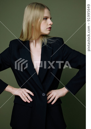 Women 's Power and the women 's movement for Feminism conceptu . A cool strict successful strong girl in an elegant suit keeps her hands on her waist. Look at me offer Women 's Power and the women 's movement for Feminism conceptu . A cool strict successful strong girl in an elegant suit keeps her hands on her waist. Look at me offer 91995649