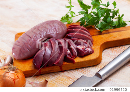 Sliced raw pork kidneys Sliced raw pork kidneys 91996520