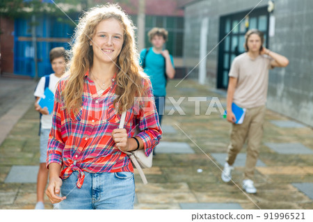Teenager girl going to school lessons Teenager girl going to school lessons 91996521