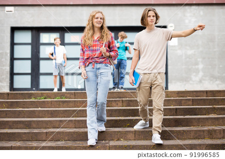 Teenagers going home after school Teenagers going home after school 91996585