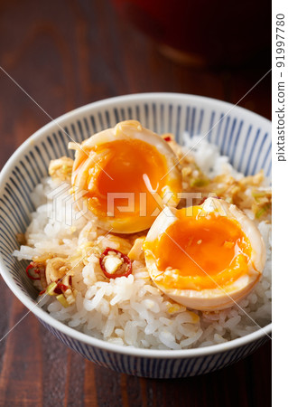 Narcotic egg on top of rice 91997780