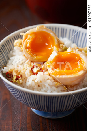 Narcotic egg on top of rice 91997782