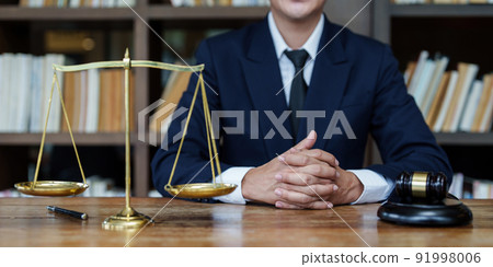Close up lawyer businessman working or reading lawbook in office workplace for consultant lawyer concept. Close up lawyer businessman working or reading lawbook in office workplace for consultant lawyer concept. 91998006