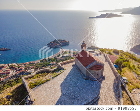 The Church of St. Sava in Montenegro, near the island of Sveti Stefan near Budwa. Drone view. Location: church St. Sava, Montenegro, Balkans, Adriatic sea, Europe 91998555
