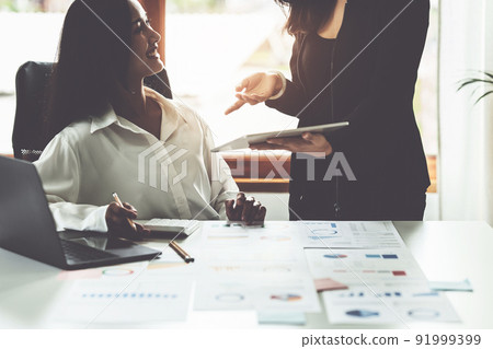 Group of IT consultant working by digital tablet and management big data and analyze financial document of company.. 91999399