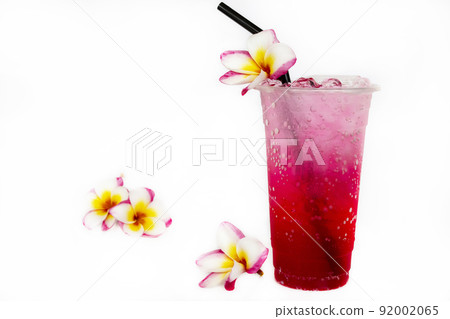 cold red soda cocktail water for relax in summer with flowers frangipani  92002065