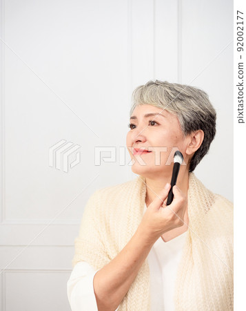 A mature 50-year-old woman's make-up portrait. 92002177