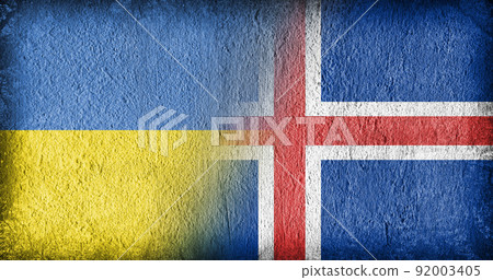 Ukrainian and Icelandic flag on concrete Ukrainian and Icelandic flag on concrete 92003405