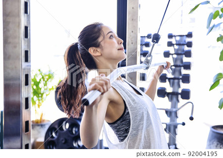 Young woman training in the gym Young woman training in the gym 92004195