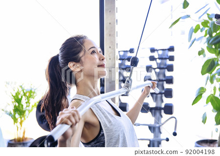 Young woman training in the gym Young woman training in the gym 92004198