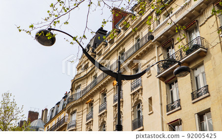 Street lamp and facades of a traditional apartment buildings of Paris France Street lamp and facades of a traditional apartment buildings of Paris France 92005425