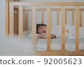 A baby who sleeps well in a crib 92005623