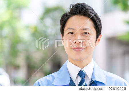 Men in work clothes, fresh green portrait Men in work clothes, fresh green portrait 92010226