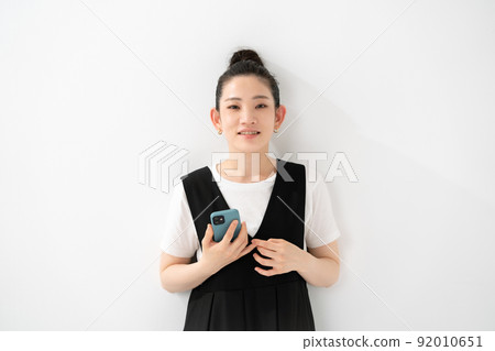 Female portrait smartphone Female portrait smartphone 92010651
