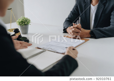 Good service cooperation, Consultation of Businesswoman and Male lawyer or judge counselor having team meeting with client, Law and Legal services concept. 92010761