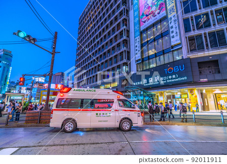 Tokyo cityscape of Japan The hottest days in central Tokyo for 7 consecutive days ... Ambulance dispatched in front of Ikebukuro station = July 1st 92011911