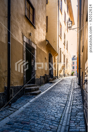 Old cobbled street of Stockholm 92012614