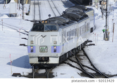 Kiha 183 series limited express Okhotsk departing from the switchback Engaru station 92013429