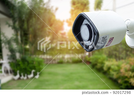 CCTV Closed circuit camera, TV monitoring in garden at home, security system concept. CCTV Closed circuit camera, TV monitoring in garden at home, security system concept. 92017298