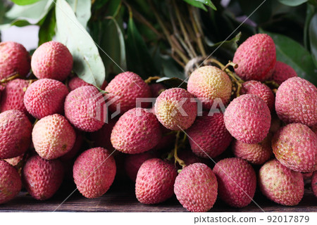 Lychee on a pink background top down. Lychee on a pink background top down. 92017879