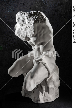 Gypsum copy of Belvedere Torso statue for artists. Replica of famous ancient Greek fragmentary marble sculpture of a male nude from Vatican Museums. Template design for art, dj, fashion, poster, zine. Gypsum copy of Belvedere Torso statue for artists. Replica of famous ancient Greek fragmentary marble sculpture of a male nude from Vatican Museums. Template design for art, dj, fashion, poster, zine. 92018250