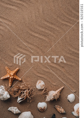 Composition frame for copy space, seashells, pebbles, mockup on sand background. Blank, top view, still life, flat lay. Sea summer vacation travel concept tourism and resorts. 92018581