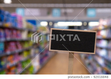 Blank Black billboard against shop Empty mockup template Blackboard label at shopping mall store. Shopping center. Department store. Shopping online Mindful spending Blank Black billboard against shop Empty mockup template Blackboard label at shopping mall store. Shopping center. Department store. Shopping online Mindful spending 92018848