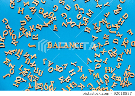 Word BALANCE made out of wooden letters on bright blue background. Motivational Words Quotes Concept. Word BALANCE made out of wooden letters on bright blue background. Motivational Words Quotes Concept. 92018857