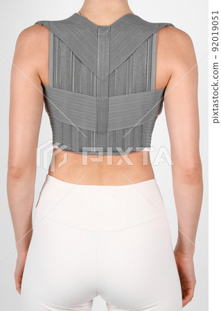 Posture Corrector isolated on white. Orthopedic lumbar support products. Lumbar Support Belts For Back Clavicle Spine. Lumbar Waist Support Belt Strong Lower Back Brace Support. Lumbar brace. 92019051