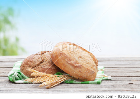 Homemade bread on wooden table Homemade bread on wooden table 92019122