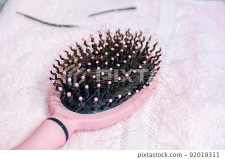 Hair loss concept. 92019311