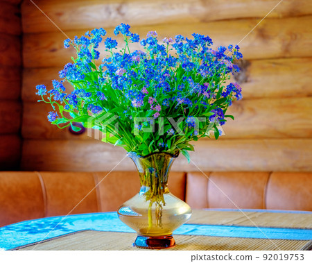 Bouquet of wild flowers on the background of a wooden wall Bouquet of wild flowers on the background of a wooden wall 92019753