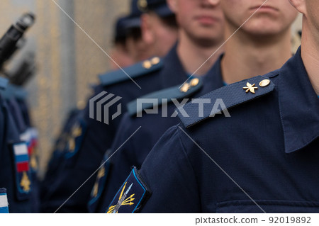 A column of military soldiers. 92019892