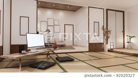 Living room interior on tatami mat floor, computer on low table and pillow.3D rendering 92020327